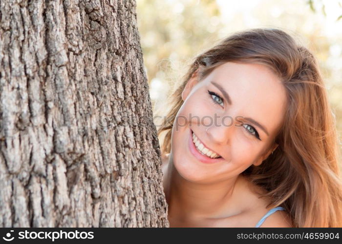 Beautiful woman on a sunny day with the wind blowing her hair