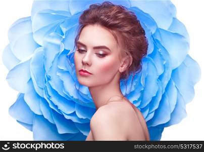 Beautiful Woman on the Background of a Large Flower. Beauty Summer Model Girl with Blue Peony. Young Woman with elegant Hairstyle and Makeup. Fashion Photo