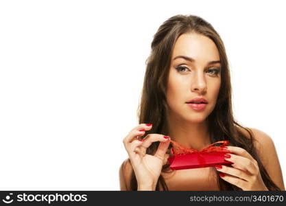 beautiful woman opening red present. beautiful woman opening red present on white background