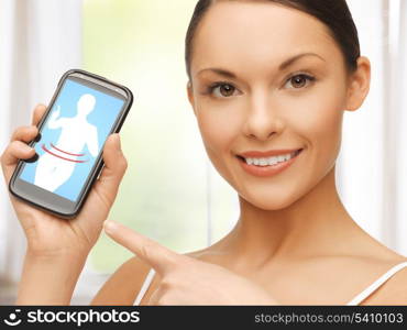 beautiful woman pointing at smartphone with application