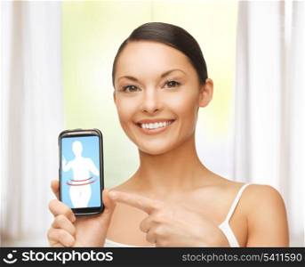 beautiful woman pointing at smartphone with application