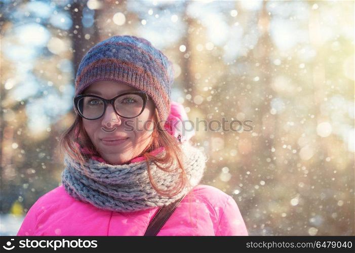 beautiful woman portrait in a winter forest. woman portrait in a winter forest