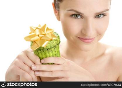 Beautiful woman portrait with a green present gift