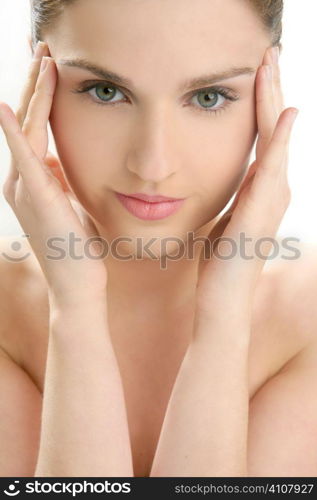 Beautiful woman portrait with hands on head isolated on white at studio