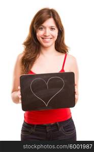 Beautiful woman presenting a black board with a heart on it