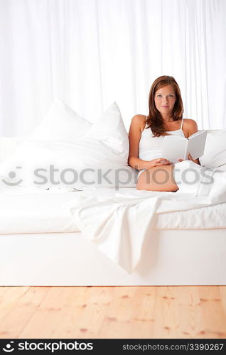 Beautiful woman reading book, shallow DOF