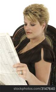 Beautiful woman reading newspaper