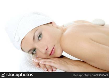 Beautiful woman relaxed on spa with stone treatment, white background