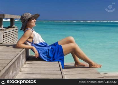 Beautiful woman relaxing on a beautiful tropical beach