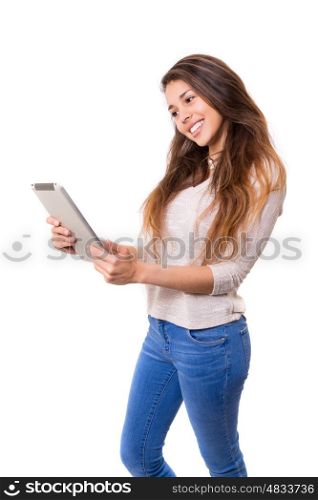 Beautiful woman relaxing with a tablet computer