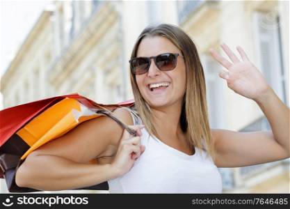 beautiful woman shopping trendy clothes