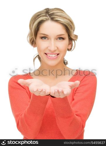 beautiful woman showing something on the palm of her hand