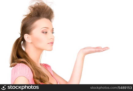 beautiful woman showing something on the palm of her hand