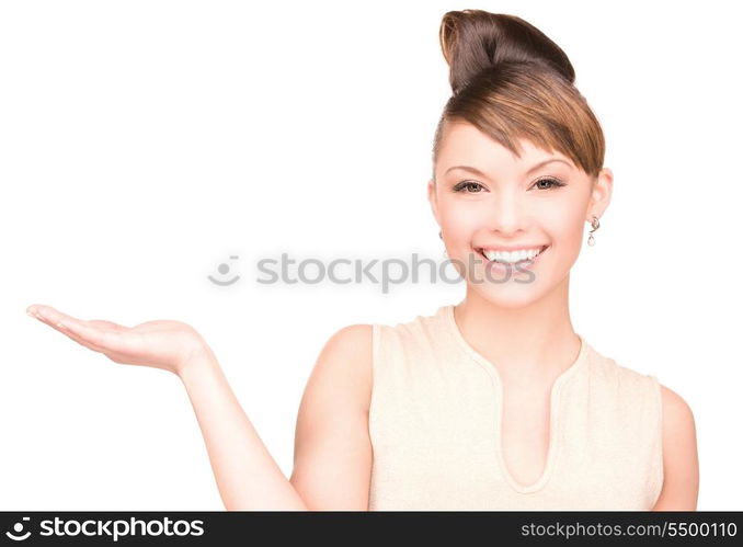 beautiful woman showing something on the palm of her hand