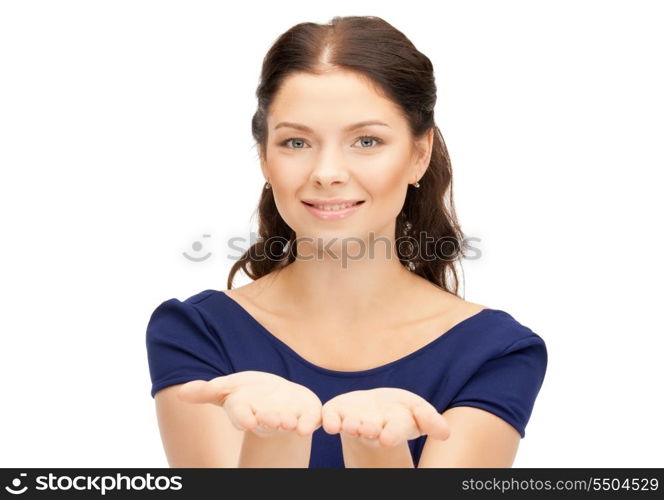 beautiful woman showing something on the palm of her hand