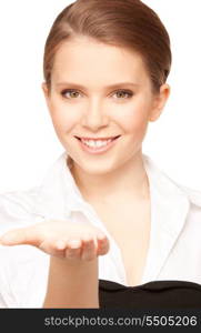 beautiful woman showing something on the palm of her hand