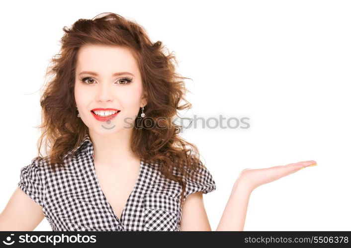 beautiful woman showing something on the palm of her hand