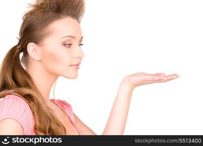 beautiful woman showing something on the palm of her hand