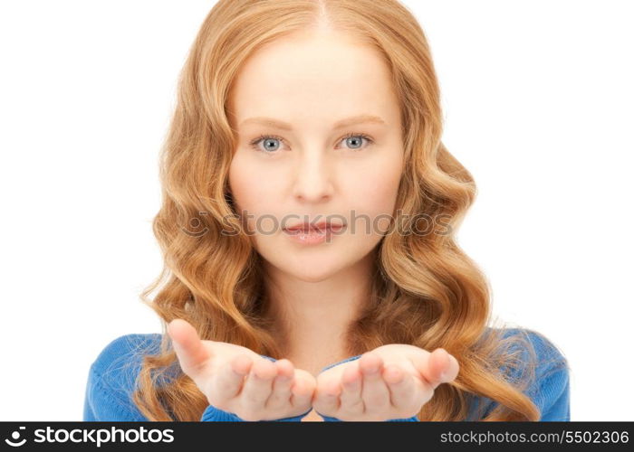 beautiful woman showing something on the palm of her hand&#xA;