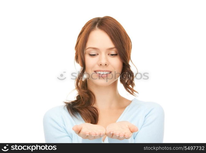 beautiful woman showing something on the palms of her hands