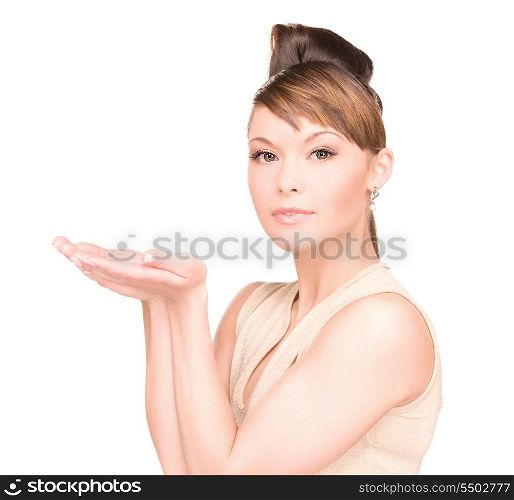 beautiful woman showing something on the palms of her hands
