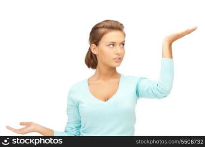 beautiful woman showing something on the palms of her hands