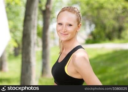 Beautiful woman smiling against blur background a