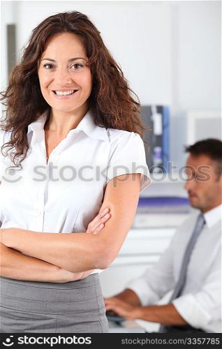 Beautiful woman standing in the office