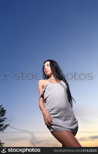 Beautiful woman standing on at the beach