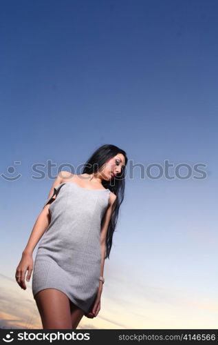 Beautiful woman standing on at the beach