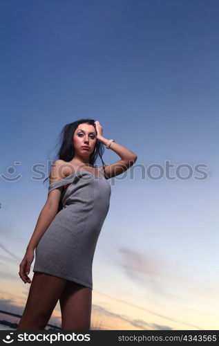 Beautiful woman standing on at the beach