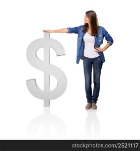 Beautiful woman standing over a Dollar symbol, isolated over a white background. Dollar Woman