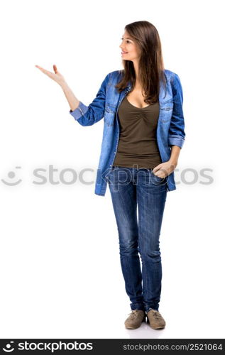 Beautiful woman standing over a white background and talking with someone. Woman talking