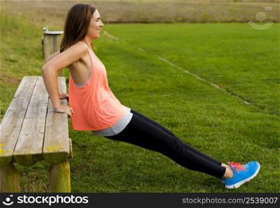 Beautiful woman stretching after finish the exercise