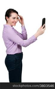 Beautiful woman taking a selfie with a cell phone