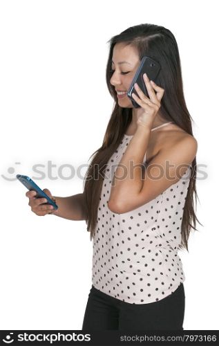 Beautiful woman talking and multitasking while juggling multiple cell phones and conversations