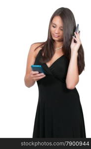 Beautiful woman talking texting and multitasking while juggling multiple cell phones and conversations