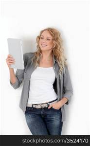 Beautiful woman using electronic tablet on white background