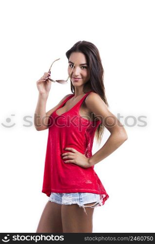 Beautiful woman wearing sunglasses over a white background