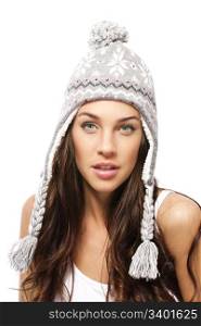 beautiful woman wearing winter cap. beautiful woman wearing winter cap on white background