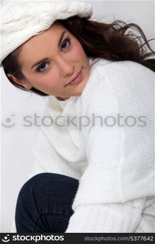 beautiful woman wearing woolen sweater and hat
