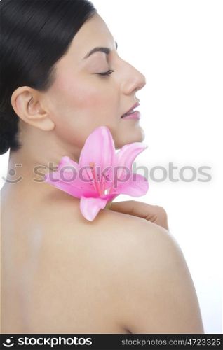 Beautiful woman with a flower