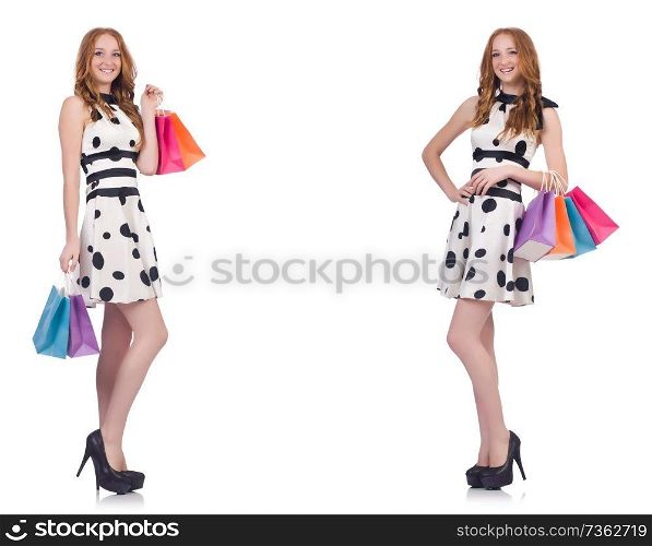 Beautiful woman with bags isolated on white 