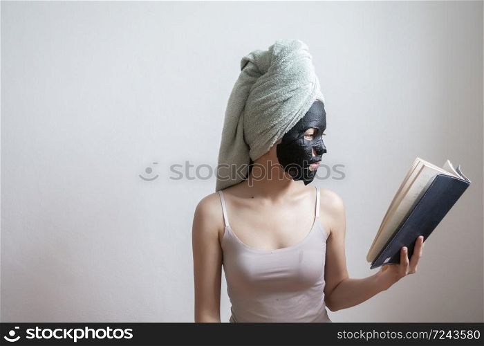 Beautiful woman with Black facial mask, Lifestyle concept