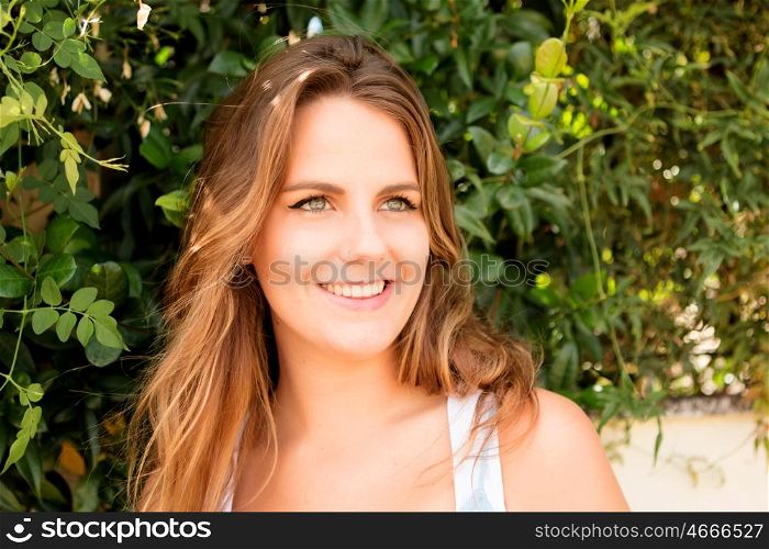 Beautiful woman with blue eyes on a sunny day outside