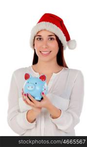 Beautiful woman with Christmas hat and piggy bank isolated on white background