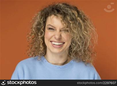 beautiful woman with curly blonde hair smiling 5