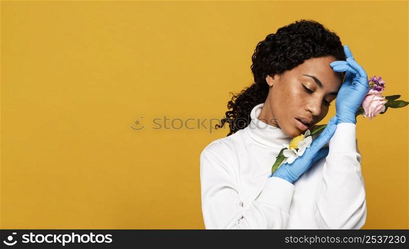 beautiful woman with floral gloves copy space