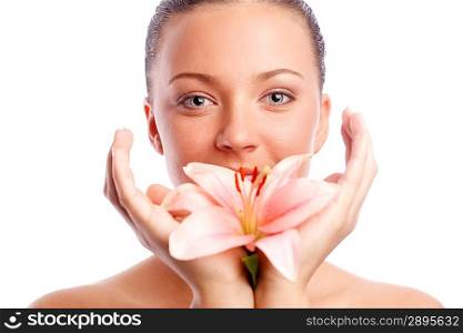 Beautiful woman with flower in hands.