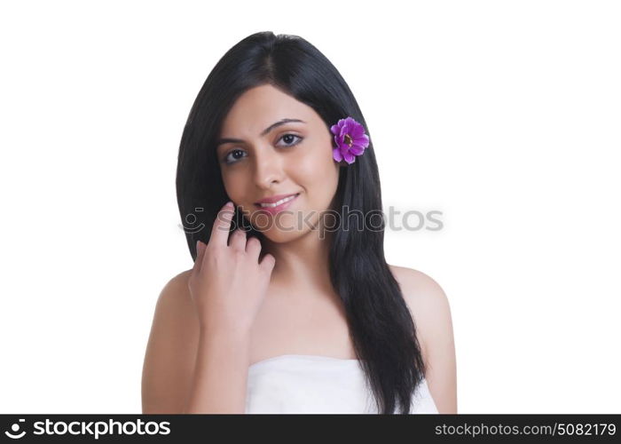 Beautiful woman with flower in her hair